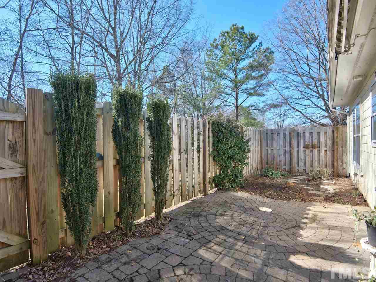 2740 Cottage Circle Raleigh, NC 27613 - Photo 21 of 25 a view of a backyard of the house