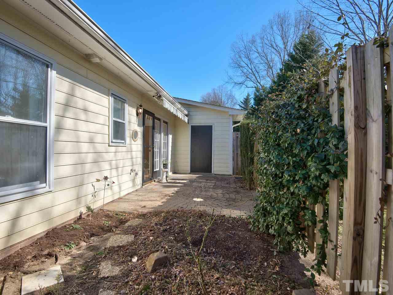 2740 Cottage Circle Raleigh, NC 27613 - Photo 22 of 25 a view of backyard with patio
