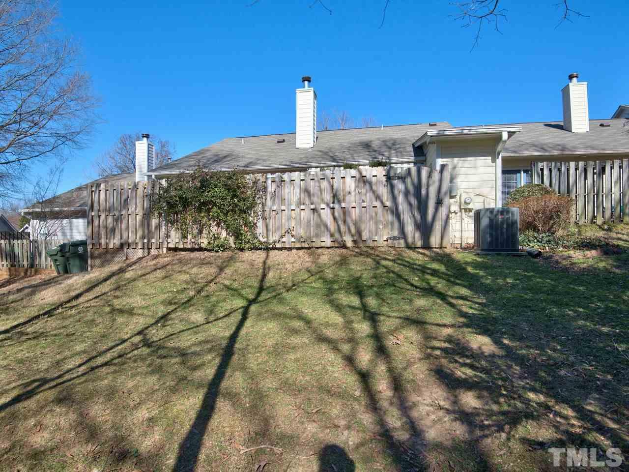 2740 Cottage Circle Raleigh, NC 27613 - Photo 23 of 25 a view of a house with a yard