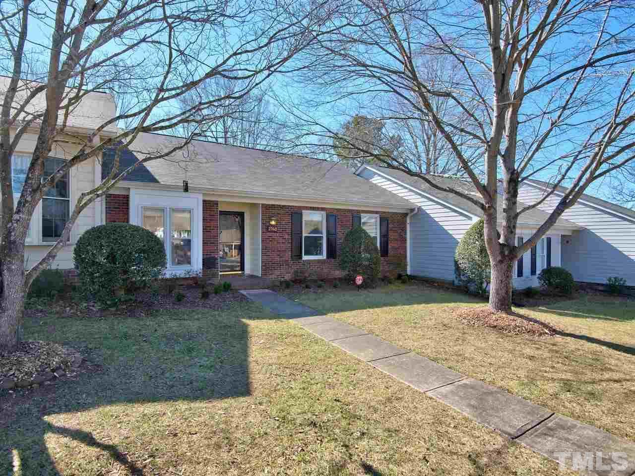 2740 Cottage Circle Raleigh, NC 27613 - Photo 24 of 25 a view of a yard in front of a house
