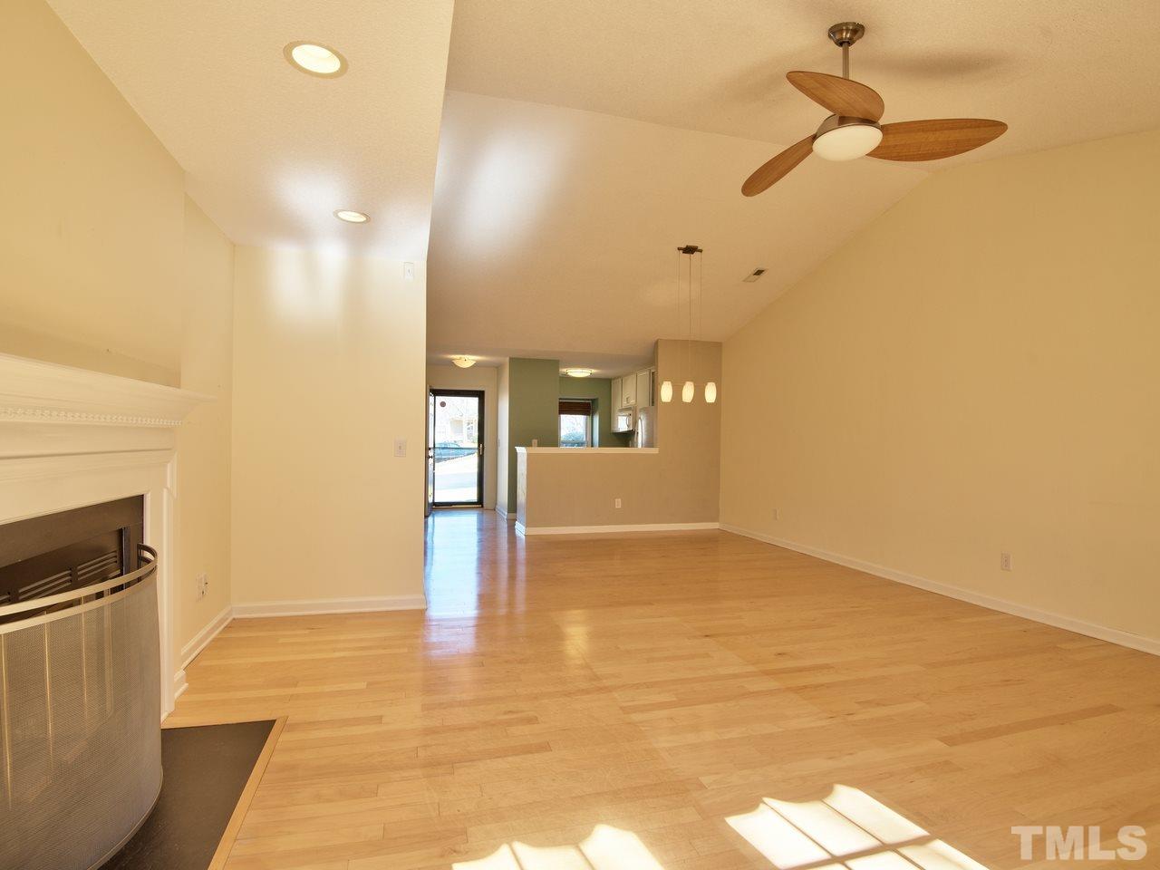 2740 Cottage Circle Raleigh, NC 27613 - Photo 8 of 25 a view of an empty room and kitchen view