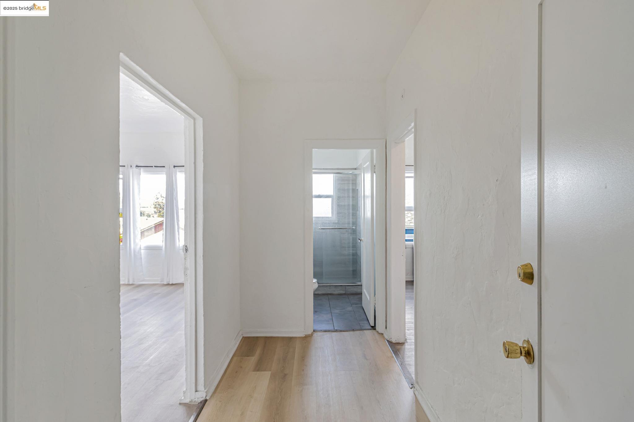 1360 Berkeley Way Berkeley, CA 94702 - Photo 13 of 35 a view of a hallway with wooden floor