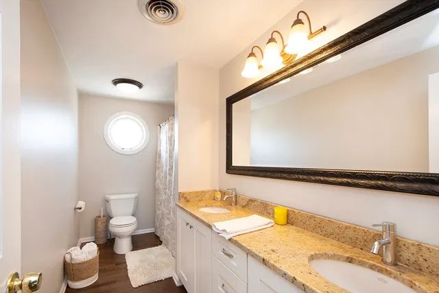 a view of entryway with wooden floor