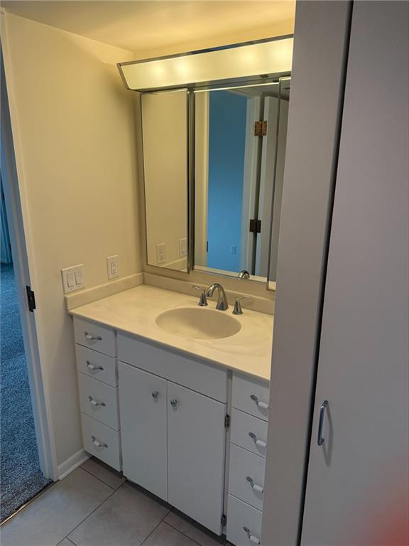 43 South 9th Street, Unit 403 Indiana, PA 15701 - Photo 9 of 14 a bathroom with a sink and a mirror