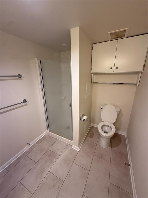 43 South 9th Street, Unit 403 Indiana, PA 15701 - Photo 10 of 14 a view of an empty room with wooden floor