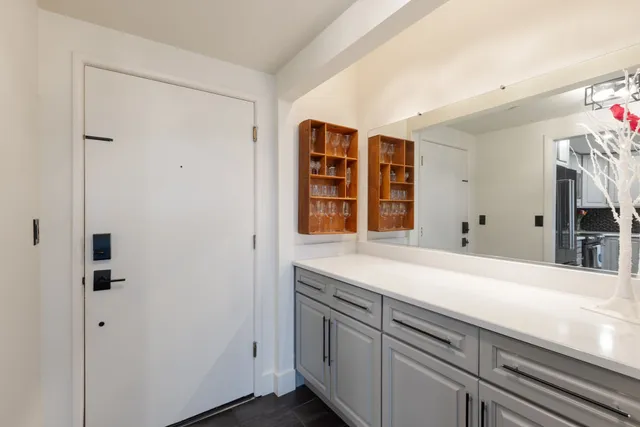 a bedroom with a bed and ceiling fan