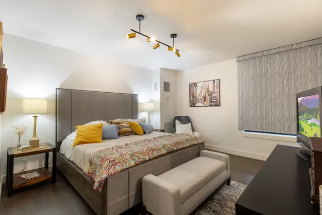 a bathroom with a sink a mirror and a toilet