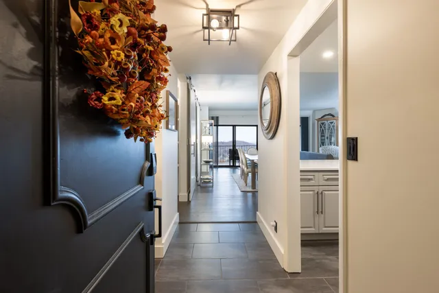 a kitchen with stainless steel appliances refrigerator a microwave and sink