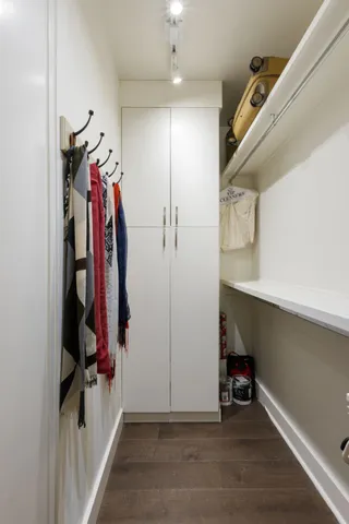 a kitchen with a sink stove and refrigerator