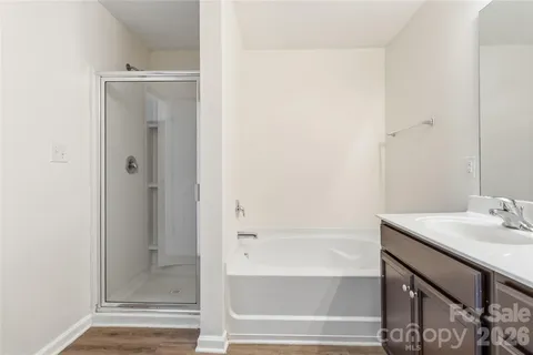 a bathroom with a bathtub and a sink