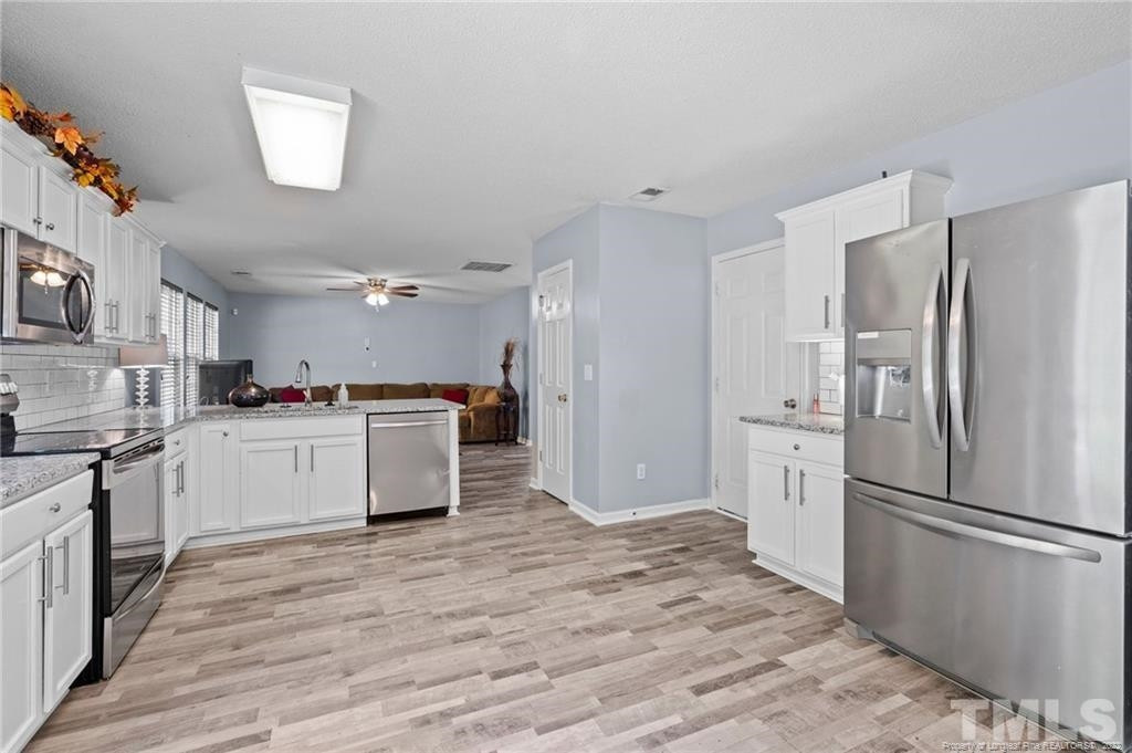 5901 Rivercliff Court Raleigh, NC 27610 - Photo 12 of 30 Photo 12