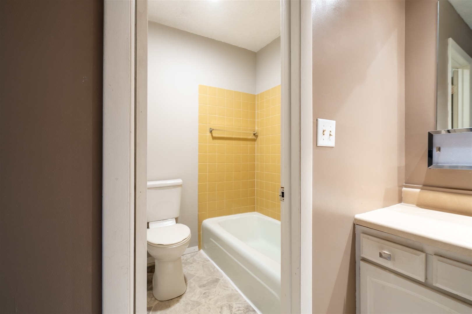 1402 Keller Road, Unit 4 Normal, IL 61761 - Photo 19 of 26 a bathroom with a sink a toilet and shower