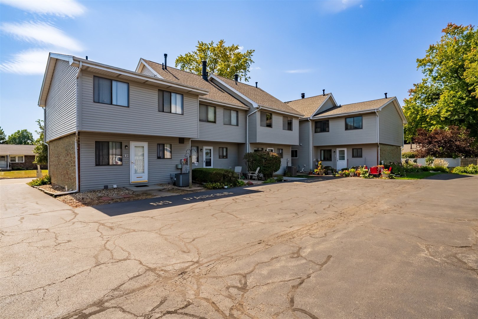 1402 Keller Road, Unit 4 Normal, IL 61761 - Photo 25 of 26 a street view with residential houses