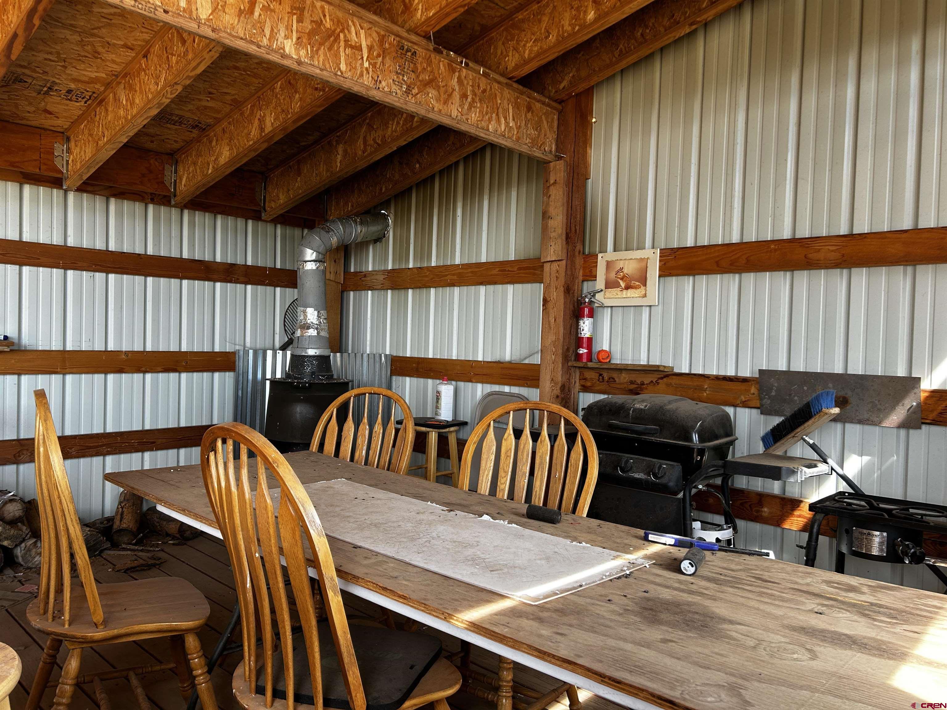 0 Currant Crk Road Cedaredge, CO 81413 - Photo 19 of 35 a view of a chairs and table in the patio