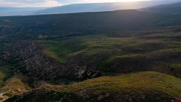 a view of mountain with lake view