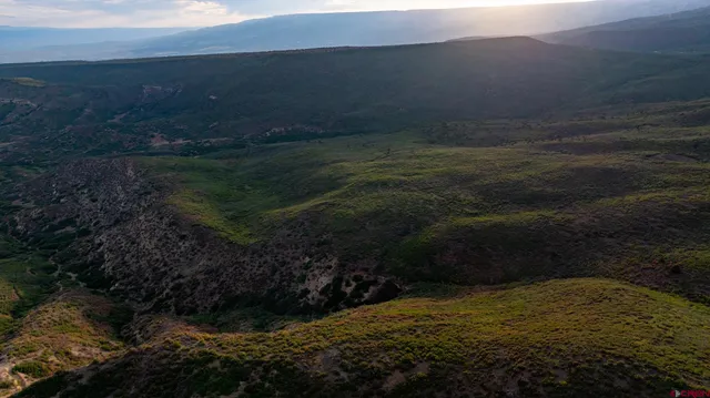 a view of mountain with lake view