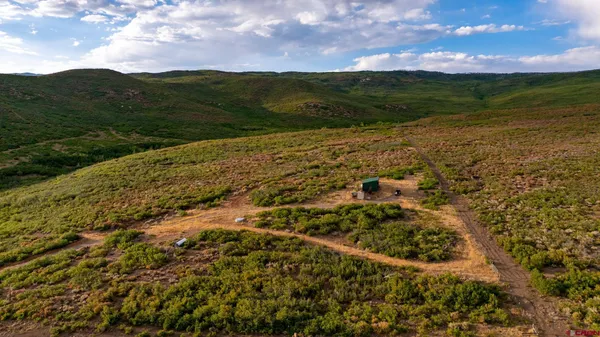 a view of a yard with an outdoor space