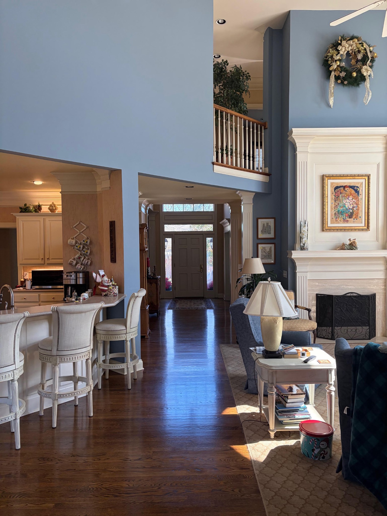 106 Hidden Point Hendersonville, TN 37075 - Photo 13 of 43 a living room with furniture a fireplace and a dining table with wooden floor