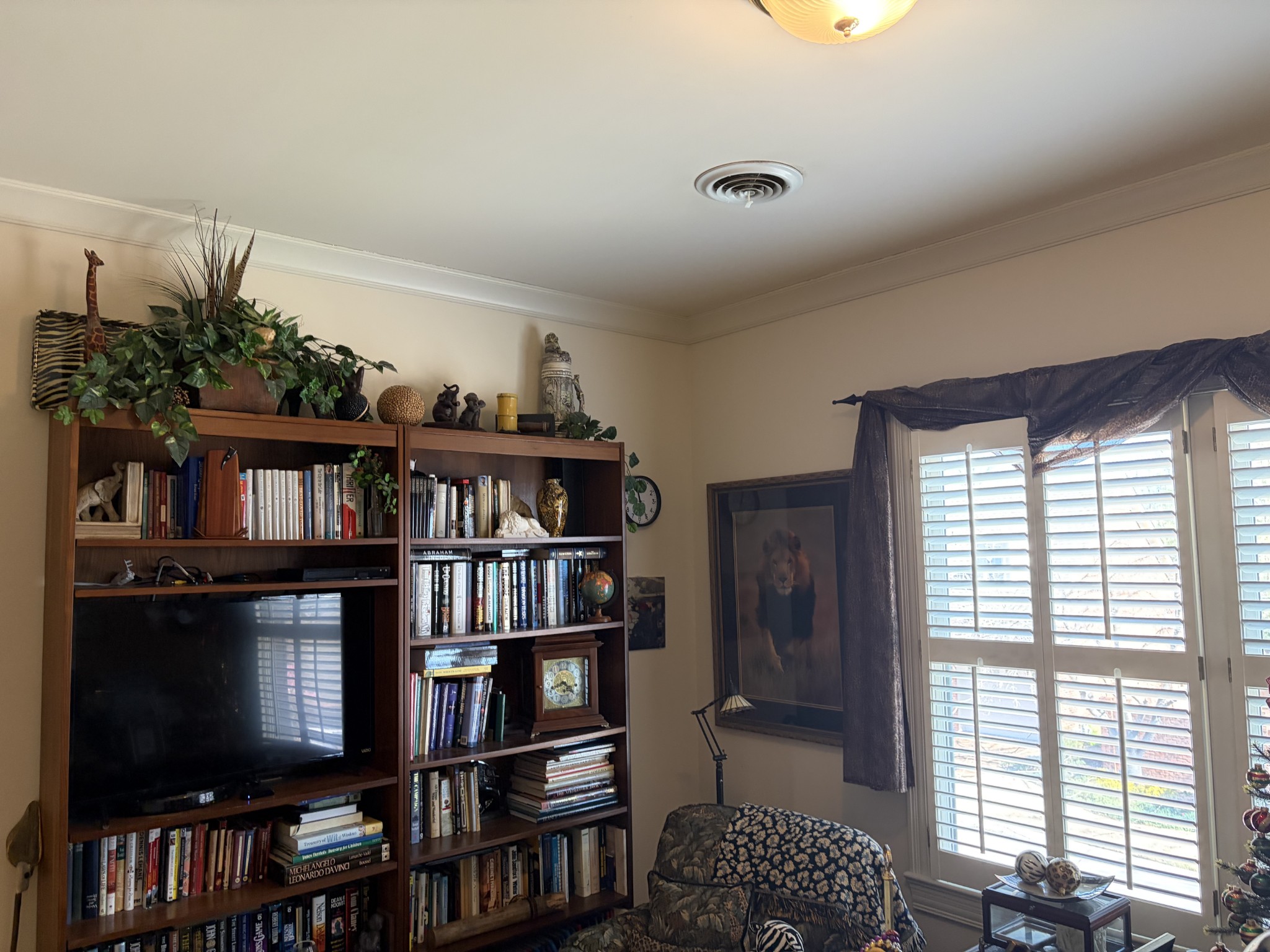 106 Hidden Point Hendersonville, TN 37075 - Photo 34 of 43 a living room with bookshelf and a window