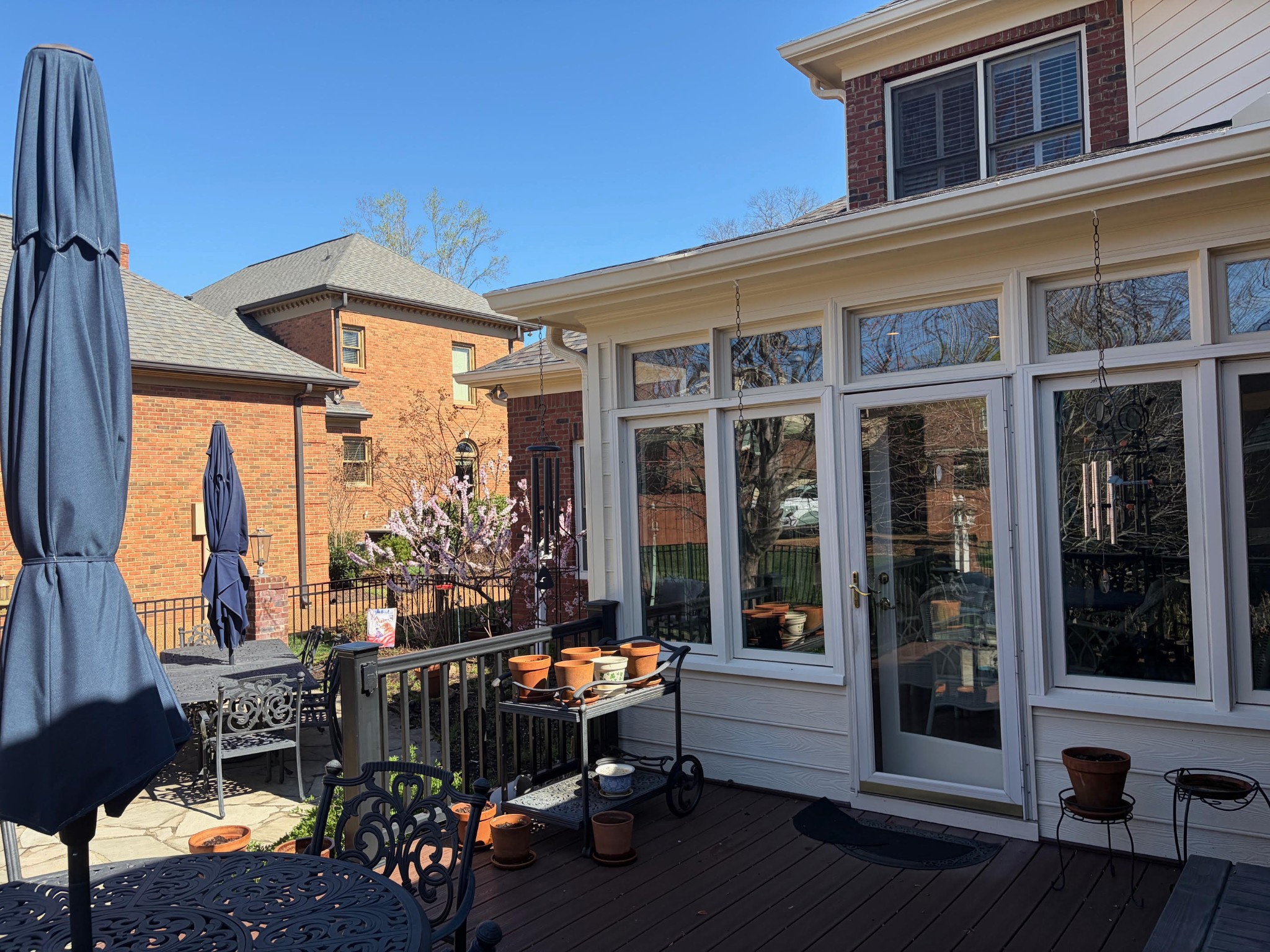 106 Hidden Point Hendersonville, TN 37075 - Photo 7 of 43 a view of a patio with table and chairs potted plants