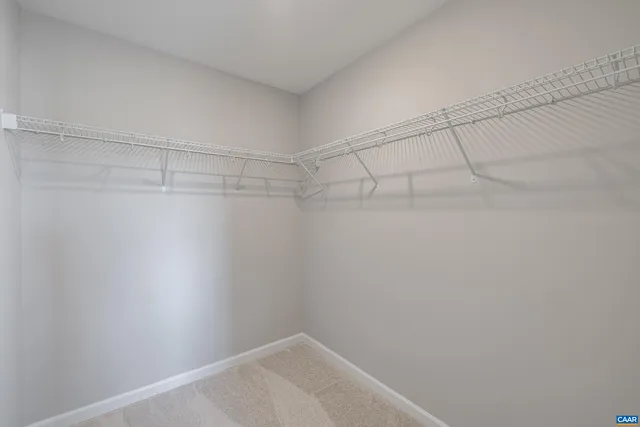 a view of a room with racks on the wall