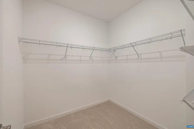 a view of a room with racks on the wall