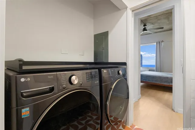 a utility room with dryer and washer