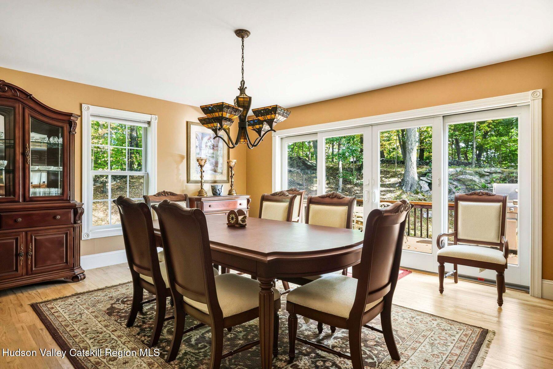 74 Bellevue Road Highland, NY 12528 - Photo 11 of 65 a view of a dining room with furniture window and outside view