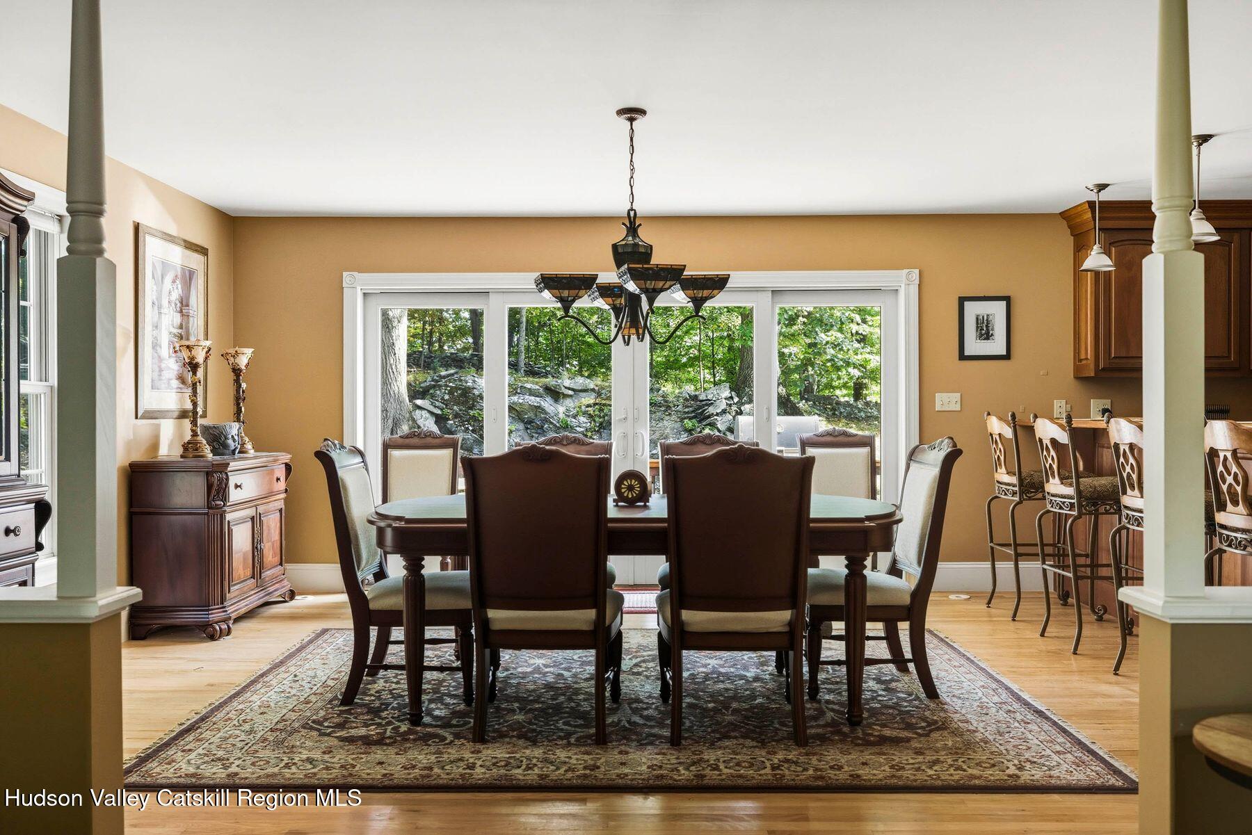 74 Bellevue Road Highland, NY 12528 - Photo 12 of 65 a view of a dining room with furniture window and wooden floor