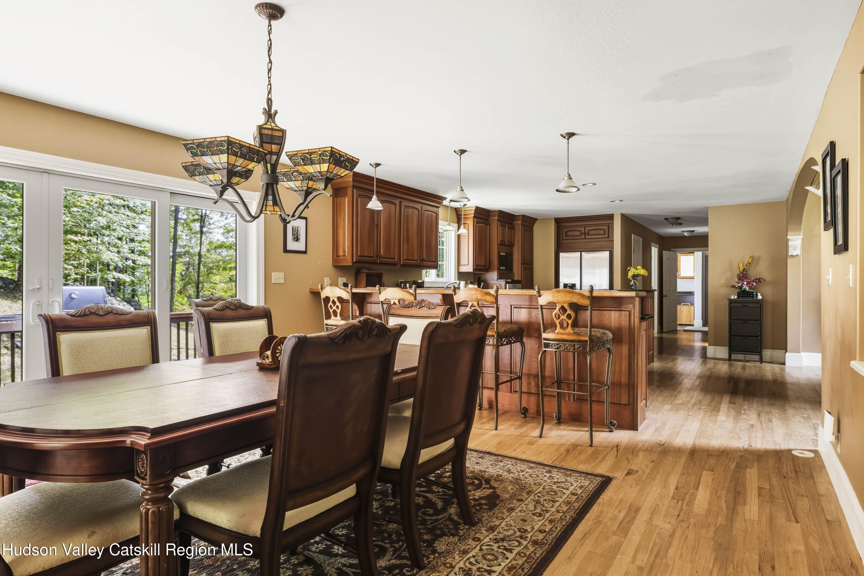 74 Bellevue Road Highland, NY 12528 - Photo 14 of 65 a view of a dining room with furniture window and wooden floor