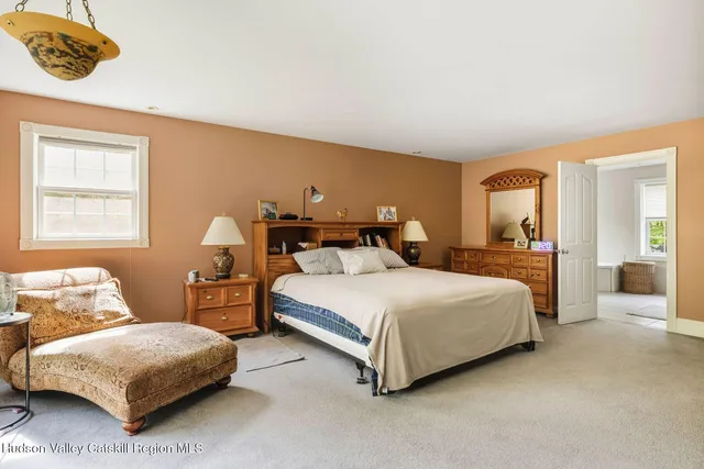 a view of balcony with furniture and wooden floor