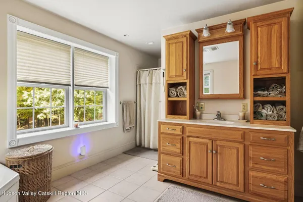 a utility room with sink dryer and washer