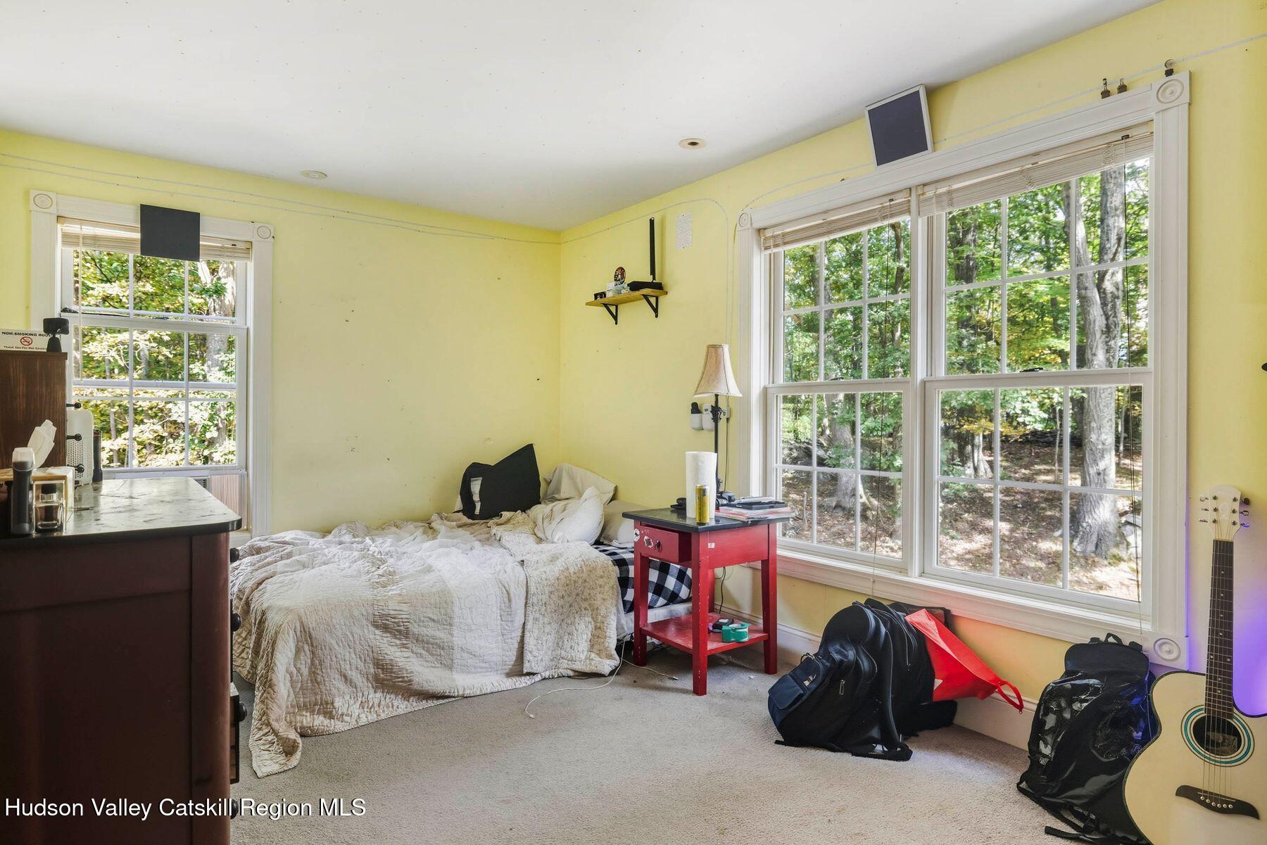 74 Bellevue Road Highland, NY 12528 - Photo 24 of 65 a bedroom with a bed and a window
