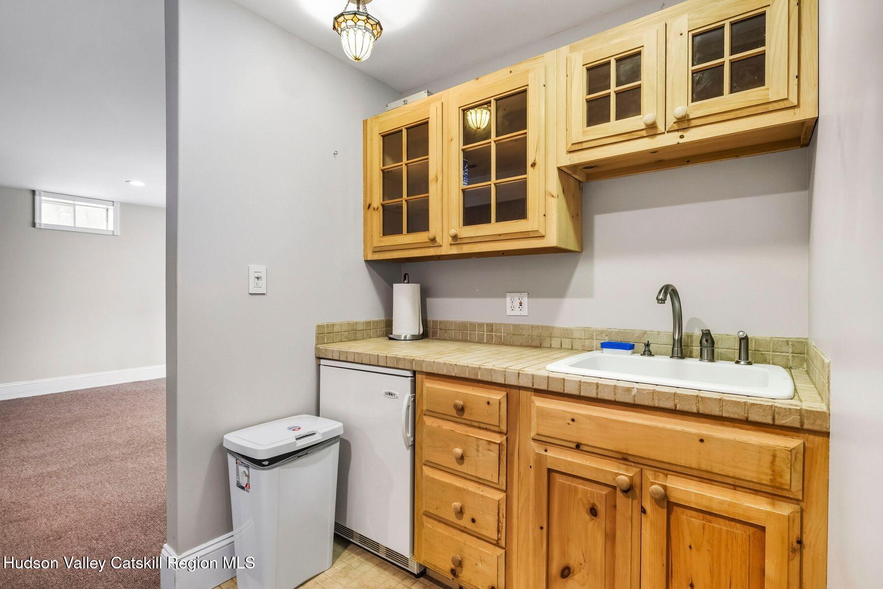 74 Bellevue Road Highland, NY 12528 - Photo 27 of 65 a view of a kitchen with stainless steel appliances granite countertop a sink stove and cabinets