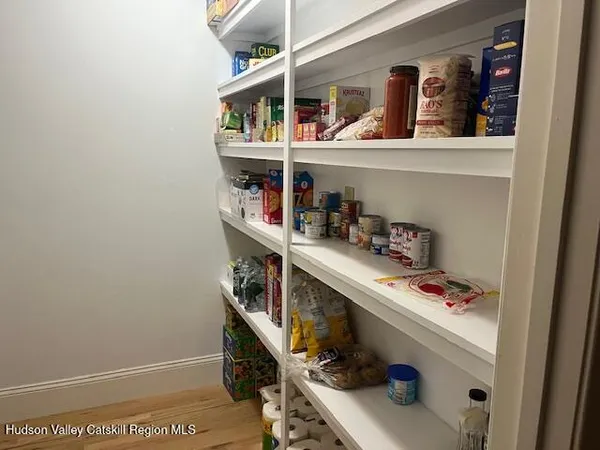 a kitchen with stainless steel appliances granite countertop a stove a sink dishwasher and a refrigerator