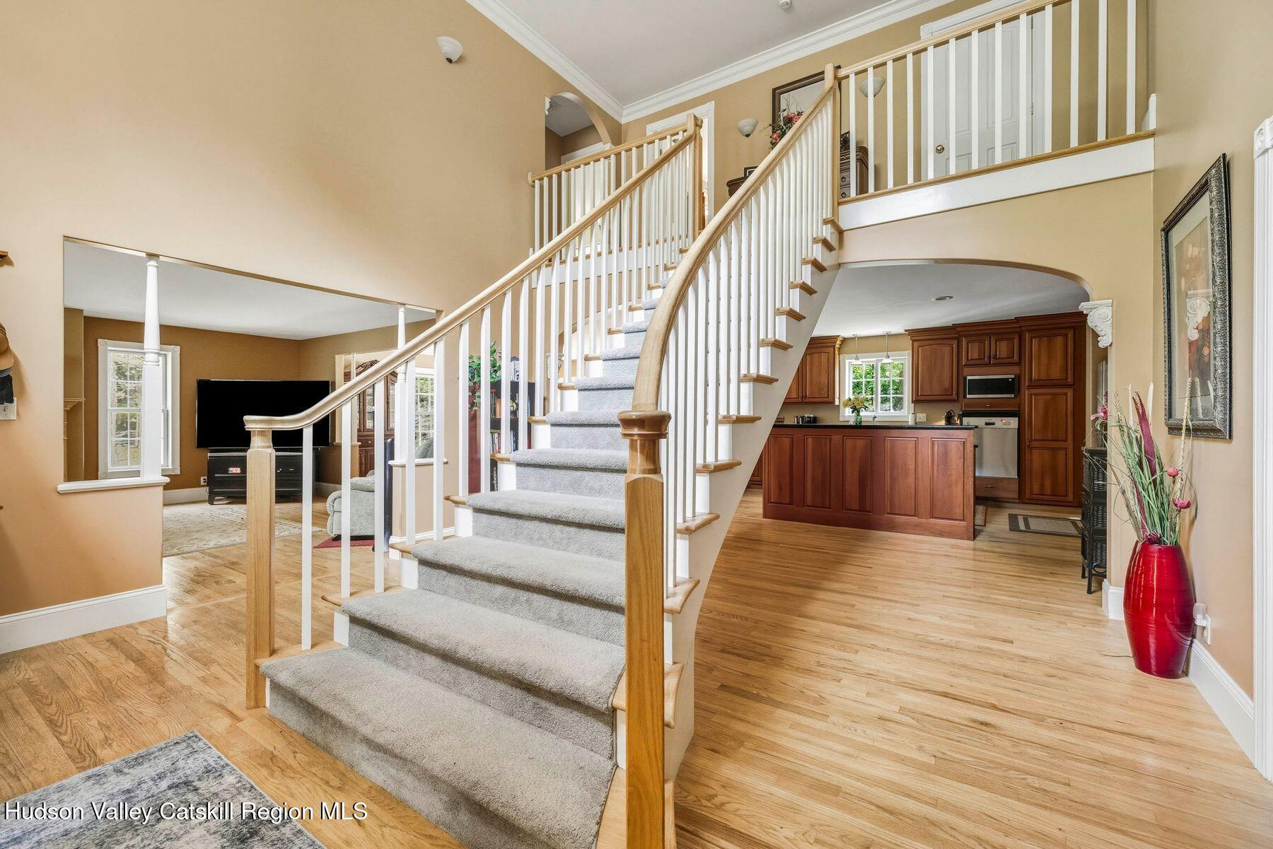 74 Bellevue Road Highland, NY 12528 - Photo 7 of 65 a view of entryway and hall with wooden floor
