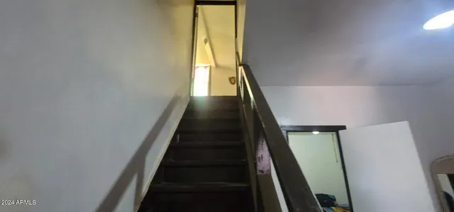 a view of walk in closet with furniture