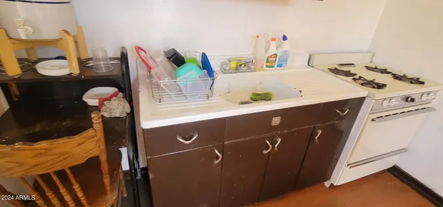 a view of an empty room and a window