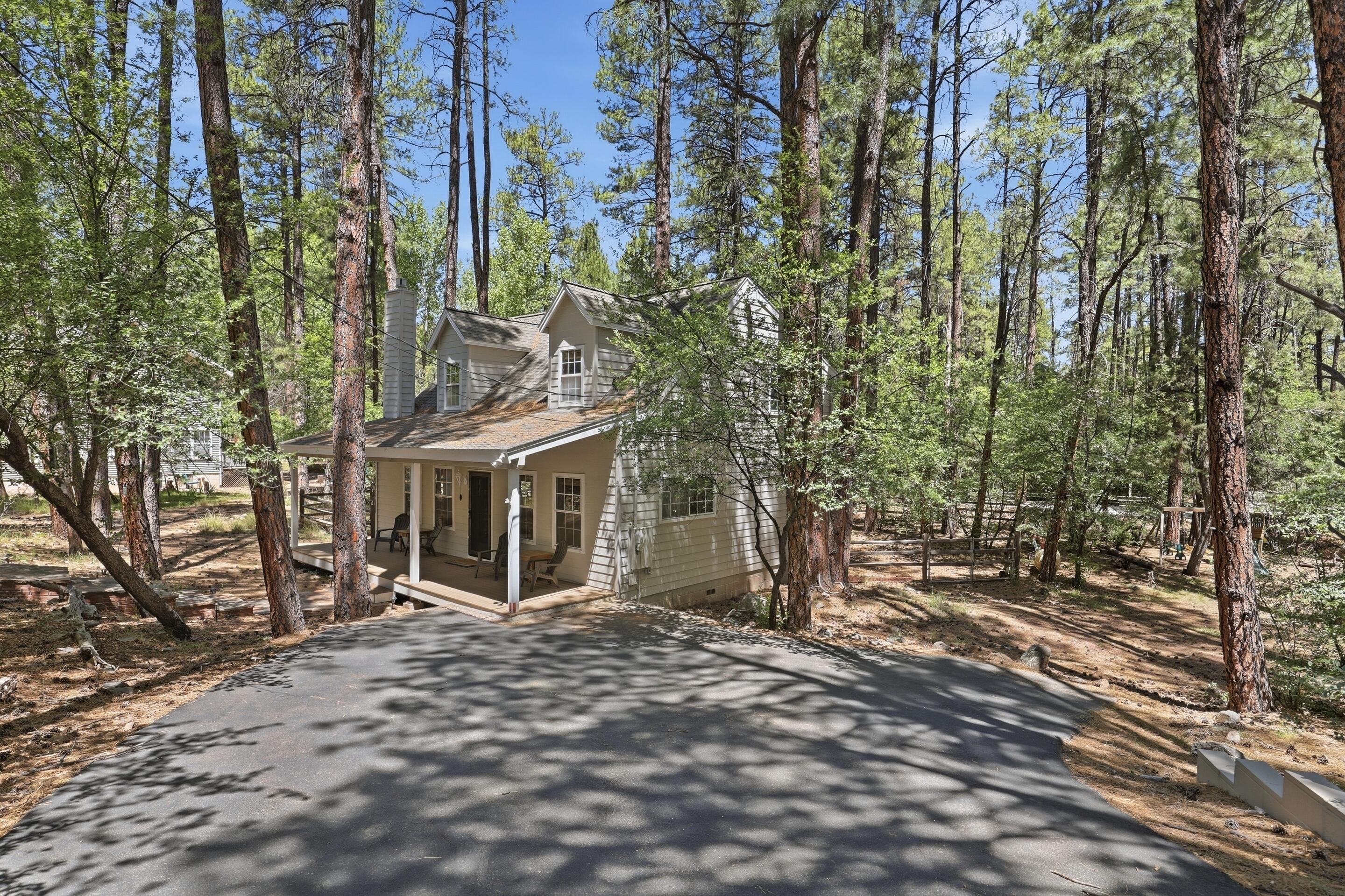 6322 Sharyn Road Pine, AZ 85544 - Photo 36 of 37 a view of a house with a tree