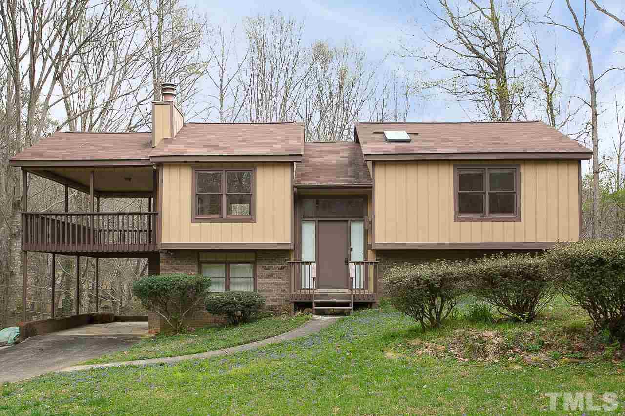6324 Rushingbrook Drive Raleigh, NC 27612 - Photo 1 of 17 a view of a house with a yard