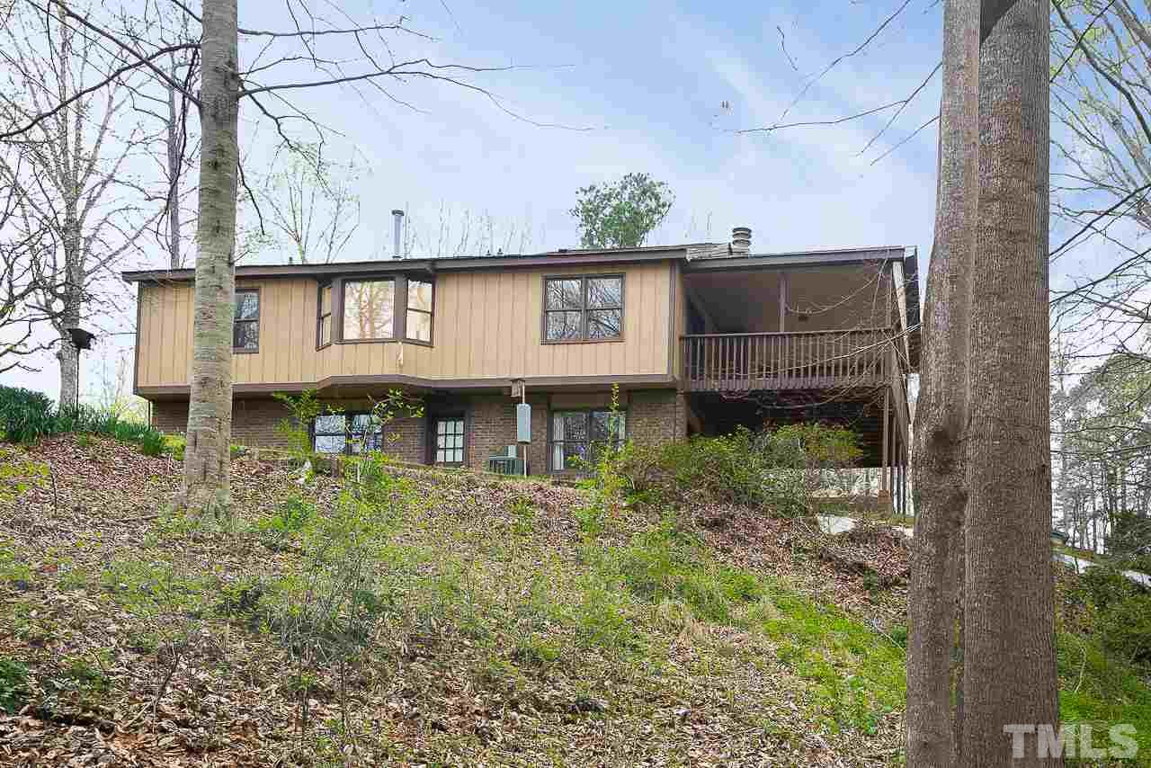 6324 Rushingbrook Drive Raleigh, NC 27612 - Photo 14 of 17 a house that has a lot of windows in it