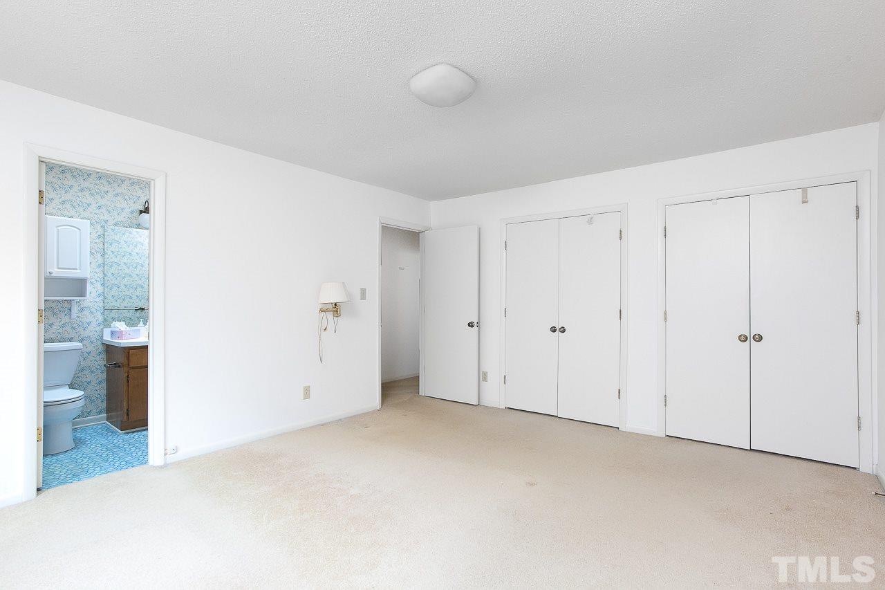 6324 Rushingbrook Drive Raleigh, NC 27612 - Photo 7 of 17 a view of an empty room