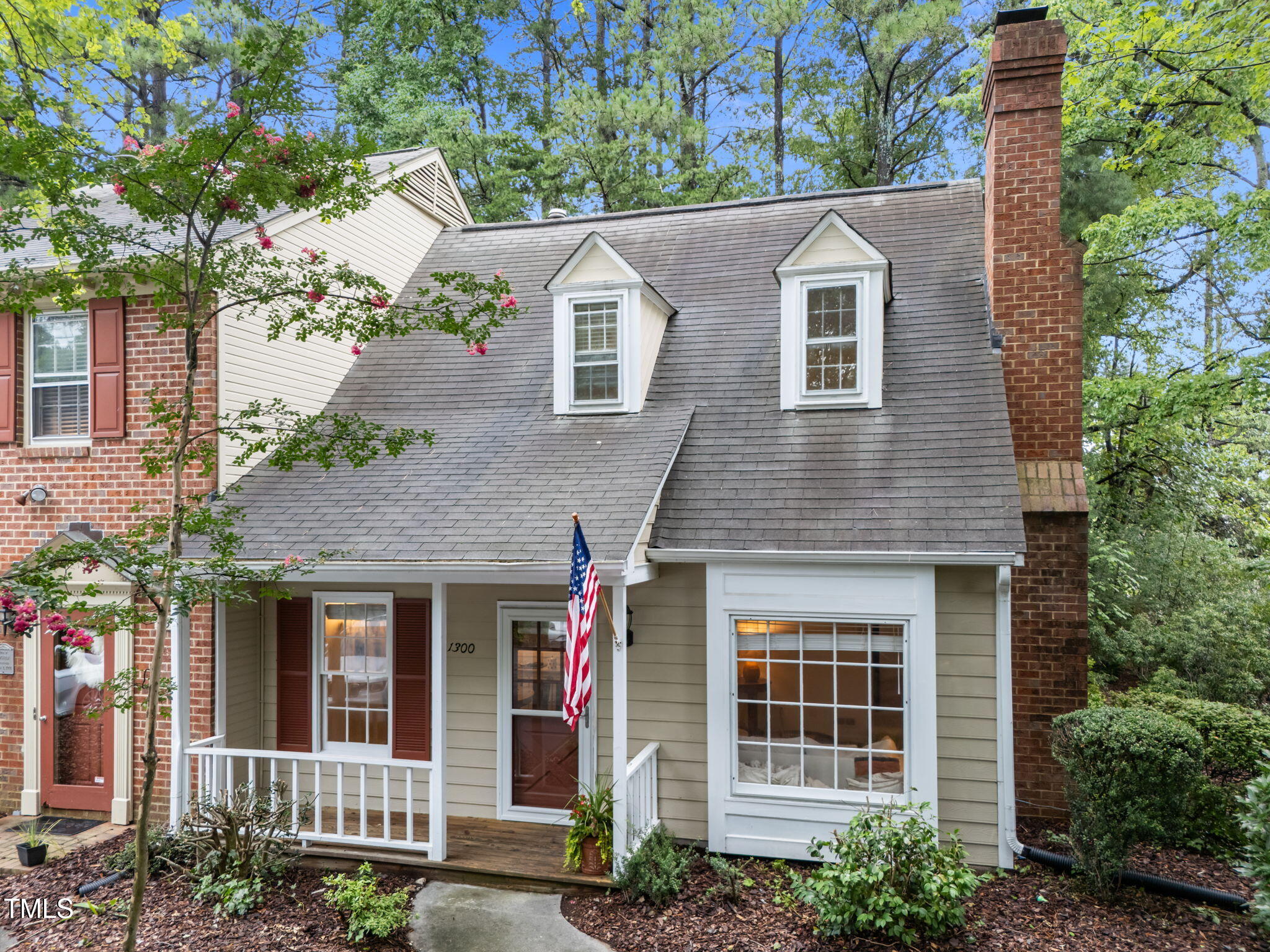 1300 Dylan Heath Court Raleigh, NC 27608 - Photo 1 of 33 1-web-or-mls-DJI_20250710090613_0880_D