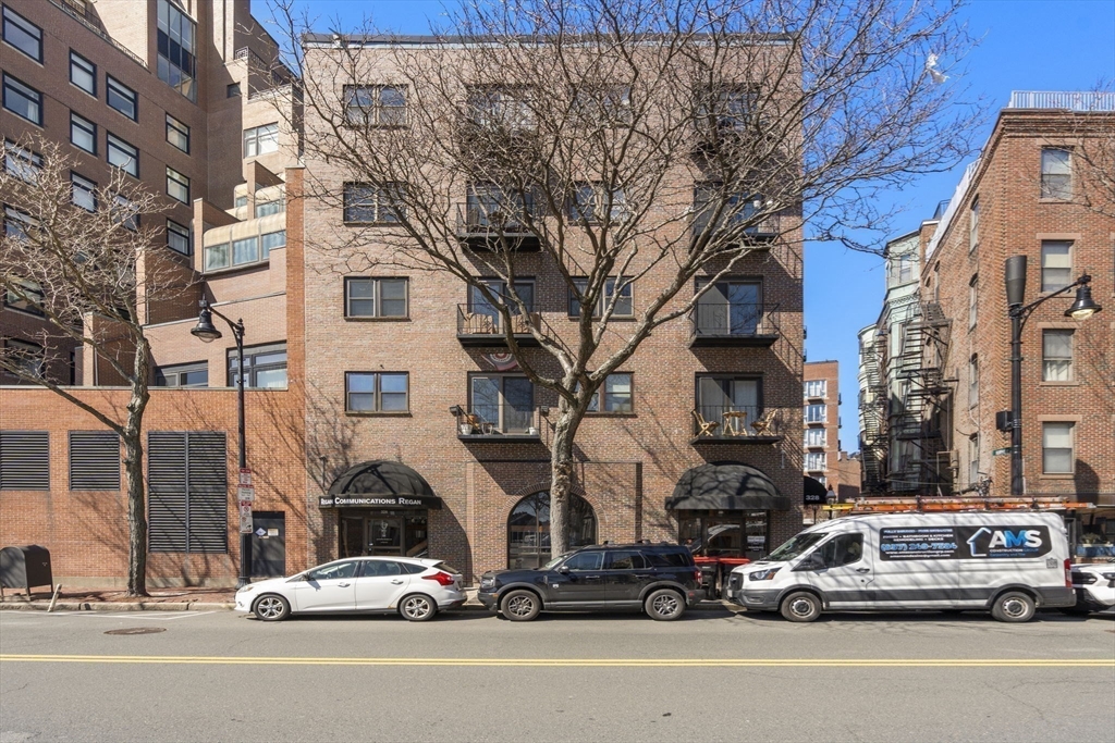328 Commercial Street, Unit 53 Boston, MA 02109 - Photo 10 of 14 a car parked in front of a building