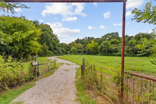 a view of a garden with an outdoor space