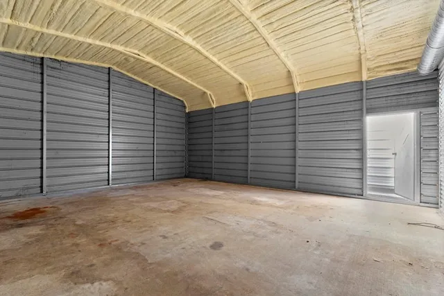 a view of empty room with garage