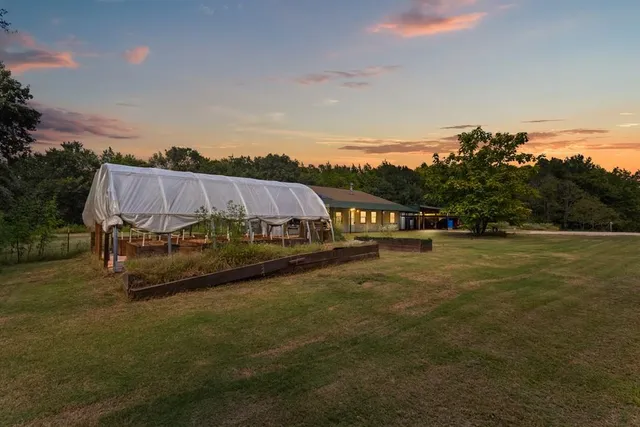 a view of a big yard next to a yard