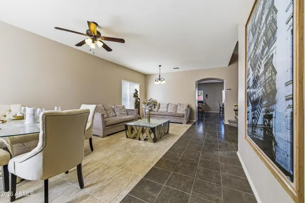 a view of a dining room with furniture and window