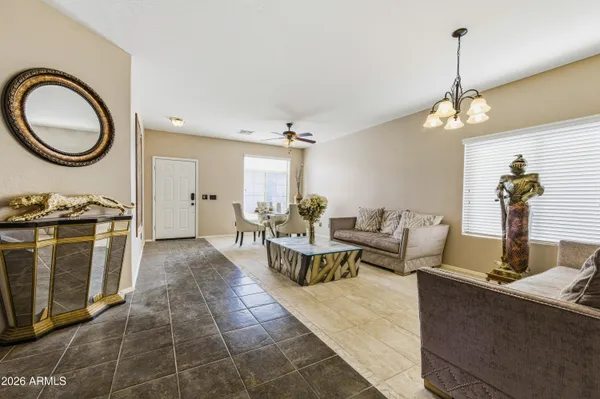 a kitchen with granite countertop a sink and wooden cabinets