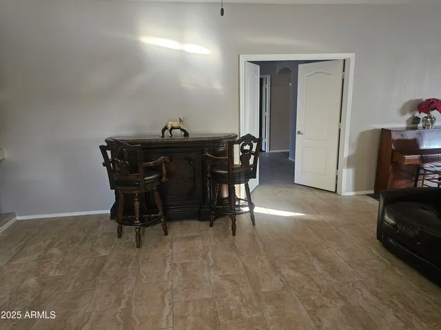 a view of a dining room with furniture